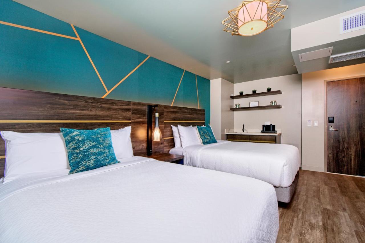 2 Double Beds Suite Balcony Partial Oceanview